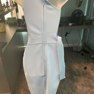Baby blue bandage dress with waistline cutout.